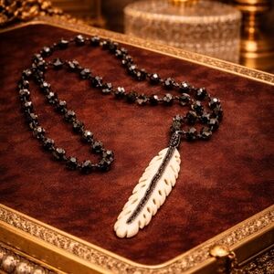 BPD Vintage 80s Black and Cream Bone Feather Pendant Necklace